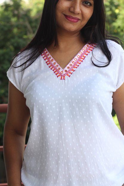 White embroidered top